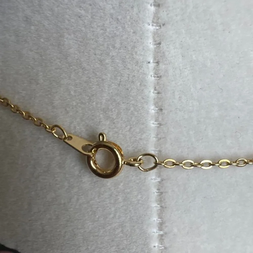 Source Unknown gold tone